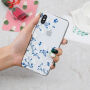 Kunststof deksel voor iPhone X / XS - witte bloemen